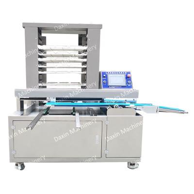 China Energy Saving Commercial Food Equipment Automatic Tray Arranging Food Aligning Machine For Baked Food for sale