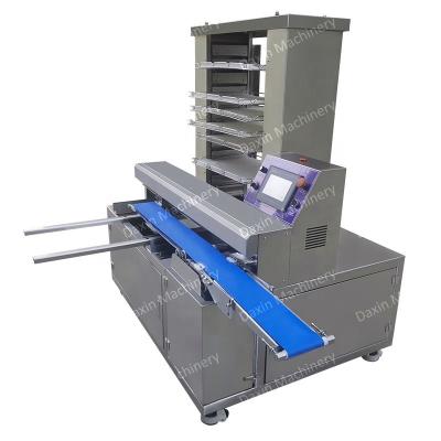 China Full Automatic Energy Saving Tray Arranging Machine Cookie Panning Machine For Cookie Maamool Mochi for sale