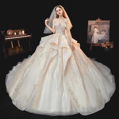 China Anti-Wrinkle Crystal Appliqued Sequin Off Shoulder Bridal Gowns Luxury Beaded Sexy Wedding Dresses for sale