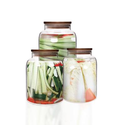 China Hot Sale Borosilicate Glass Food Storage Stackable Storage Freshness Preservation Jars Container Sealed Jars With Bamboo Lid for sale