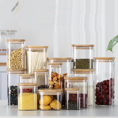 China Hot Selling Freshness Preservation Wholesale Borosilicate Kitchen Airtight Sealed Glass Jars With Wooden Bamboo Lid for sale