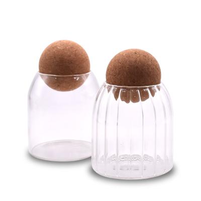 China Handmade 16oz 25oz 33oz Food Storage Canister Borosilicate Glass Jar With Cork Lid Ball Stopper for sale