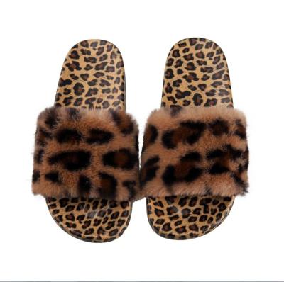 China 2021 Fashion Trend Hot Leopard Printed Fluffy Faux Fur Slides For Ladies Wholesale Women's Flat Plush Fur Indoor Slides Slippers for sale