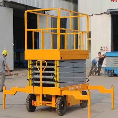 China 500KG capacity Electric Scissor Lifts hydraulic portable Self-propelled en venta