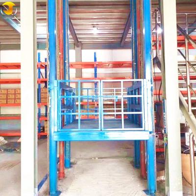 China Tavol Light duty wall mounted electric goods lift hydraulic cargo elevator for warehouse for sale