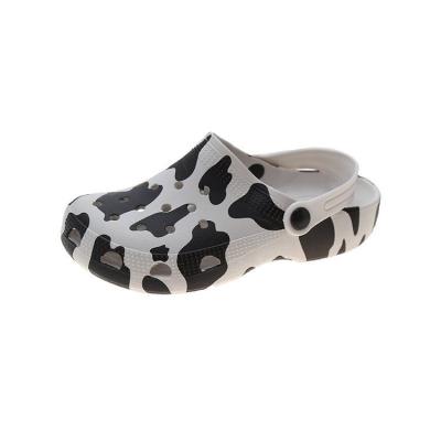 China Factory Detection SGS Factory Best Drain Anti-Smell Printing Cow Anti-Smell Eva Clogs Outlet High Quality Material Hairy Price Clogged Women for sale