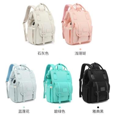 China Multifunctional Backpack Mother and Baby Bag USB Mama Bag New for sale