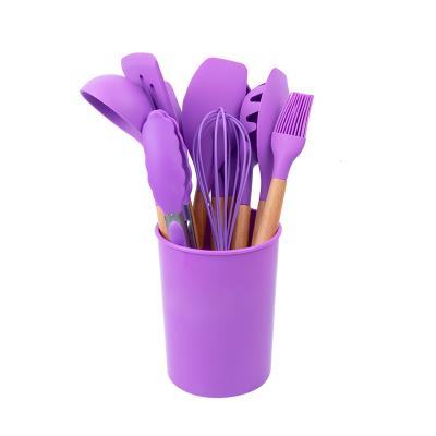 China Viable newcomer 12 pieces silicone utensil set with wooden handle and silicone holder kitchen utensils accessories for sale