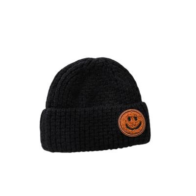 China JOINT Winter Women Wholesale Custom Knitted Smile Acrylic Logo Knit Beanie Hats Embroidery Beanies Hats for sale