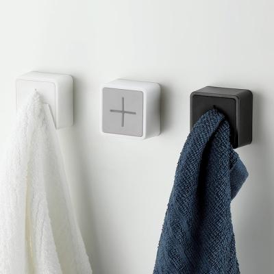 China Modern Creative Kitchen Storage Towel Clip Towel Storage Socket Plastic Towel Holder Hook for sale