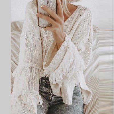 China Breathable Autumn And Winter Loose Knit Sweater V Neck Solid Color Fringed Oversized Sweater Women New Fashion for sale