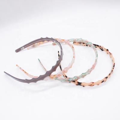 China Korean Trendy Hair Decoration Leopard Headbands New Fashion Acetate Toothed Headbands For Girls Women for sale