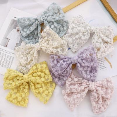 China Latest Hair Decoration Design Fresh Bright Colors Girl Hair Clips Shapes Lace Flower Butterfly Embroidered Hair Clips For Women for sale