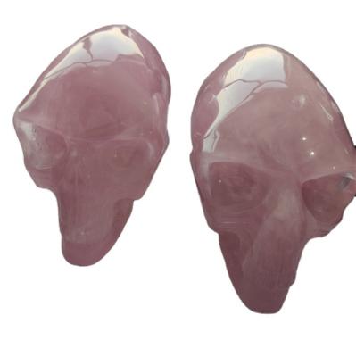 China Europe long head natural rose quartz crystal skulls hand carved crafts crystal skulls for sale for sale