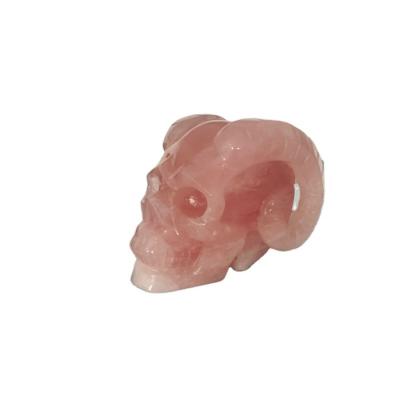 China Europe Crystal Open Natural Realistic Hand Cut Heal Stone Rose Quartz Crystal Skulls for sale