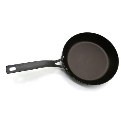 China General use for pre-seasoned gas and induction cooker carbon steel skillet with cast iron handle for sale