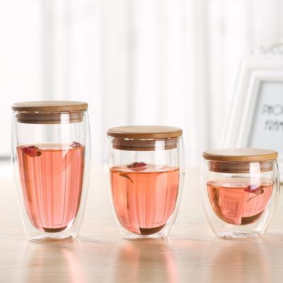 China Double Wall Glass Sustainable Popular Coffee Mugs Round Shaped Glass Tea Cups With Wooden Lid For Home for sale