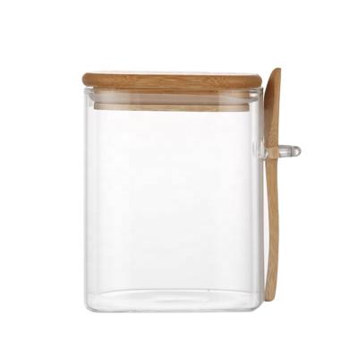 China Right Side Heatable Square Jar Glass Storage Jar with Airtight Bamboo Lid and Spoon for sale