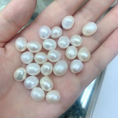 China Beads For Jewelry Making 9mm White Freshwater Pearl Non Porous Oval Baroque Rice Shaped Pearl Bracelet Earring Necklace for sale