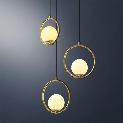 China Modern simple bedside home lighting small dining room decor Nordic gold ball glass LED pendant lamp for villa for sale