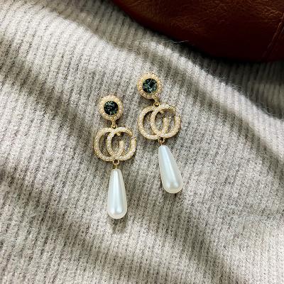 China 2022 new large pearl earrings designer long double C single diamond diamond cc romantic dangle earrings for sale