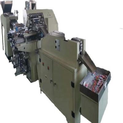 China Candy Wrapping Tablet Wrapping Machine Automatic Sweet Roll Wrapping Machine for sale