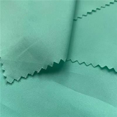 China 50D 50D Woven 60GSM Athletic Spandex Fabric 100 Polyester Fabric Green 150cm 59in for sale