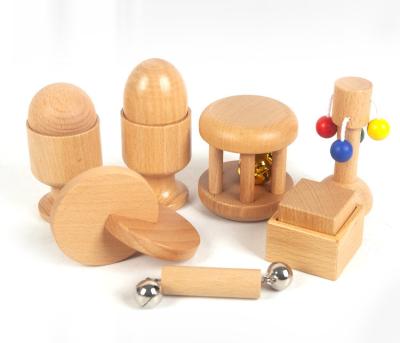 China 2022 Musical Infant Cartoon Intellectual Developmental Toy Set Wooden Shake Bell Rattle Baby Egg Cup Training Montessori Musical Box for sale