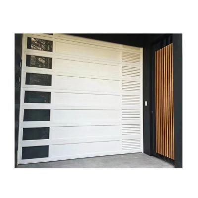 China Chinese windproof high quality cheap industrial door sectional automatic garage doors from best seller for sale