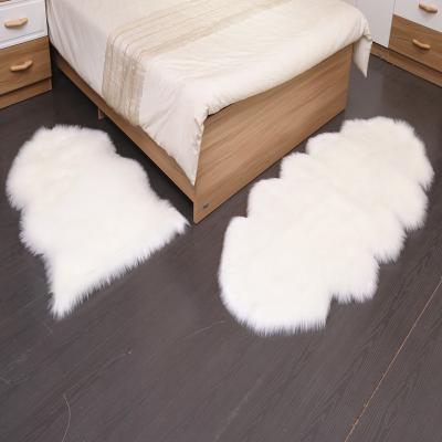 China Soft And Warm Washable Wholesale Long Hair Fluffy Acrylic Fibers Artificial Wool Suede Faux Fur Rug Blanket Fabric for sale