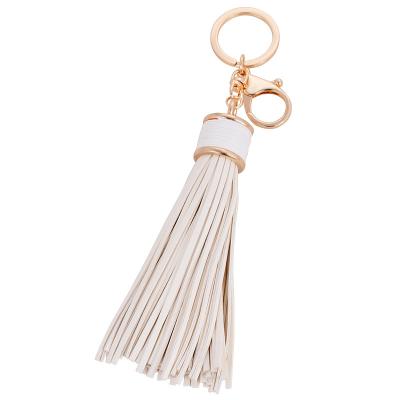 China Fashion korea best selling golden metal key ring girl's gifts bag hanging leather tassel keychain for sale