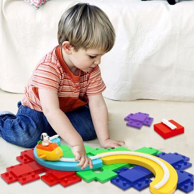 China Creative Toy Education Kids Playing Track Slot 44pcs Puzzle Rail Car Assembly Diy Interlocking Toy Bricks Race Track Building Block for sale