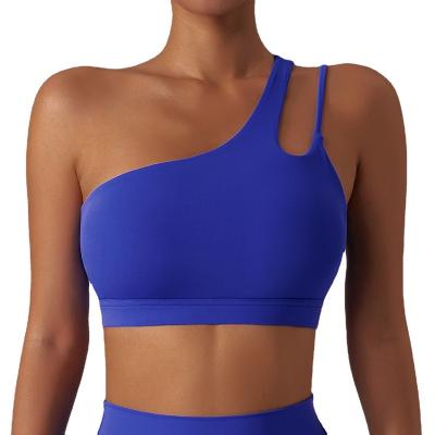 China Custom Logo Antibacterial One-Shoulder Yoga Bra Women Gym Workout Training Fitness Sports Bra Shockproof Bra for sale