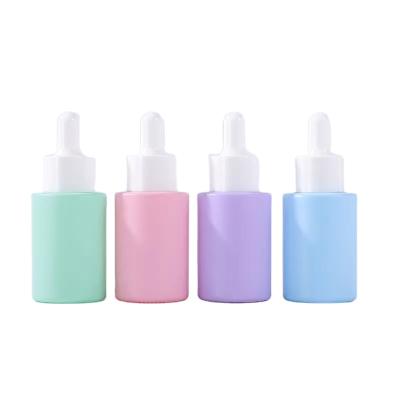 China Free Sample 30ml 1oz High Quality Colorful Frosted Yellow Blue Green Flat Shoulder Serum Dropper Glass Bottles Pink Purple for sale