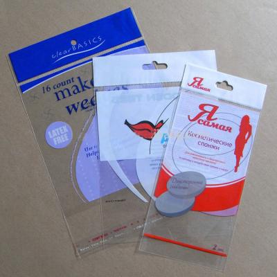 China Recyclable colorful printing header bopp transparent hanging opp plastic bag with self adhesive strip from China for sale