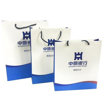 China Various Recyclable Customized Logo Printing Luxury Big Promotional Shopping Paper Bags , Craft Paper Bags With Nylon Rope Handle for sale