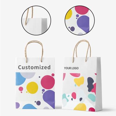 China Recyclable Free Sample Custom Logo Paper Bag With Handle Gift Bag Wholesale Custom Shopping Bag for sale