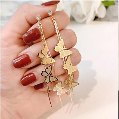 China PUSHI Simple Cheap Simple Rhinestone Tassel Metal Stud Earrings Butterfly Earrings Gold Plated Long Earrings For Wholesale for sale