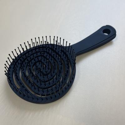 China For Home Use Styling Detangling Hairbrush Personalized Curved Bristle Hollow Nylon Pin Plastic Blending Hair Brush for sale