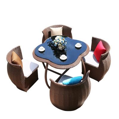 China Waterproof Fabric UV-Resistant Rattan Furniture Set Outdoor Garden Chairs And Table Hotel Cafe Rattan Chairs With Table for sale