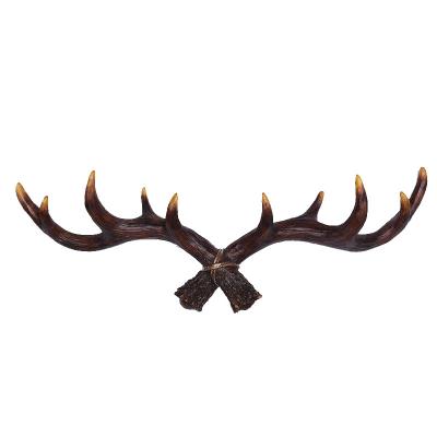 China Wholesale Viable Resin Antler Clothing Coat Wall Art Hanger Hook For Home Decoration for sale