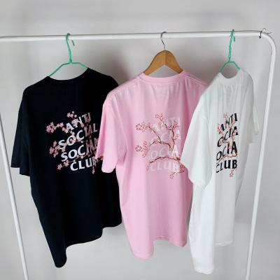 China Anti-wrinkle beautiful fashion unisex T-shirt ASSC peach blossom casual letter printing loose round neck T-shirt for sale