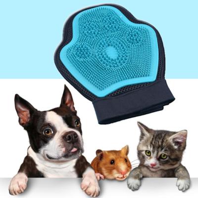 China Sustainable Dog Bath Brush Comb Pet Massage Sweep Soft Rubber Pet Hair Removing Product for sale