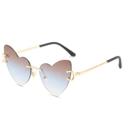 China 2022 Newest Fashion Sunglasses Women's Heart Rimless Sunglasses for sale