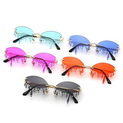 China Trendy Sun Glasses Sun Glasses Rimless Teardrop Fire Dripping Rhinestones Tear Shape Diamond Sunglasses Shades for sale