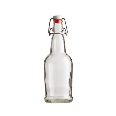 China Food Grade 16 Oz Cut Out Glass Top Cap Bottle for sale