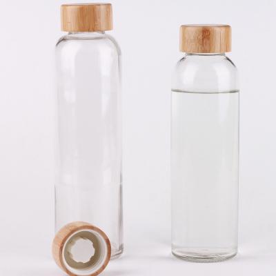 China Viable wholesale bamboo glass water bottle lid custom 550ml glass water bottle, glass drinking bottle for sale