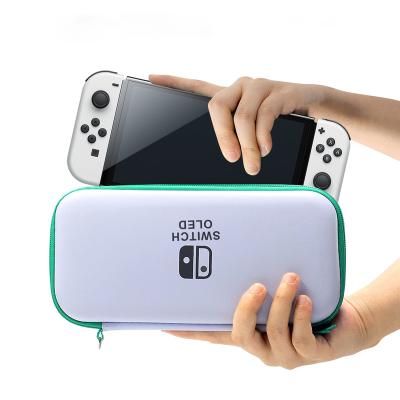 China New Portable Switch Oled Case Travel Case with Handle and 10 Game Card Slots for Nintendo New Swith OLED Carrying Case for sale