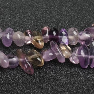 China Wholesale Natural Ametrine Tumble Cat's Eye Purple Irregular Crushed Stone for sale