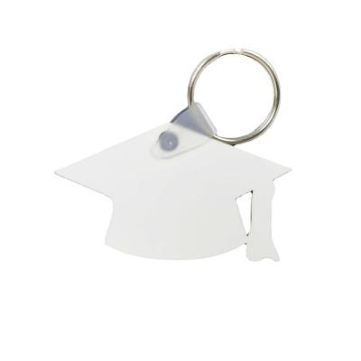 China Newly Sublimation Printing MDF Keychain Graduate Cap Blank Shape Wooden Key Flag Gift For Graduation for sale